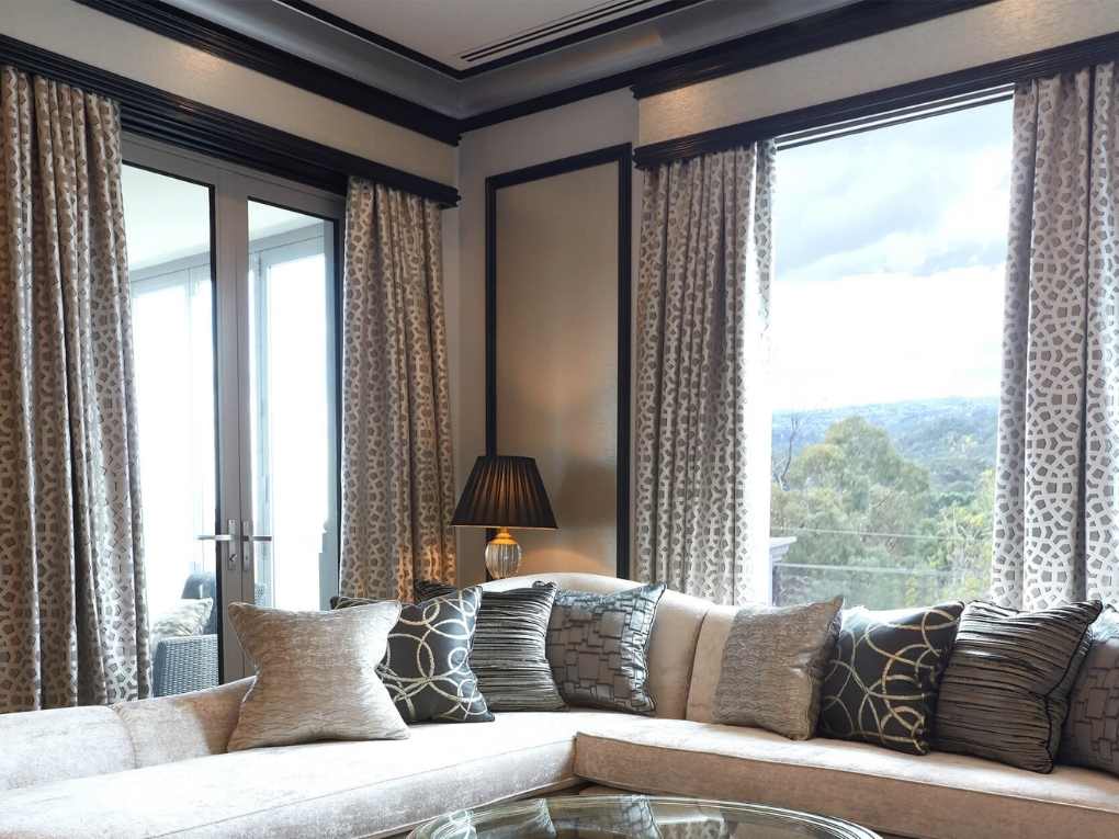 Custom silk drapes on tailored window frame