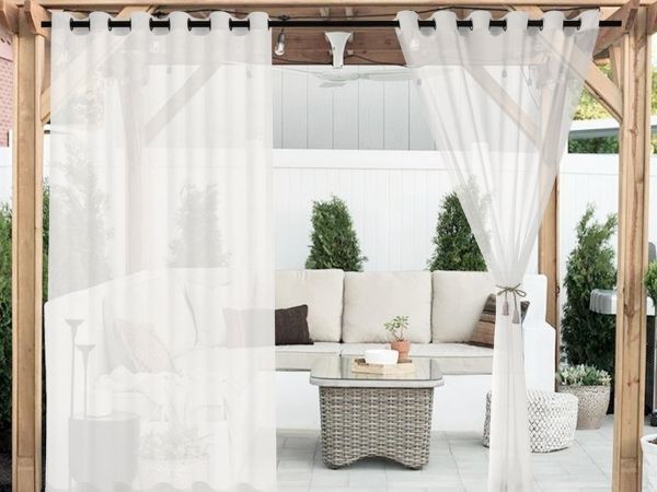 Sheer white curtains in Dubai lounge