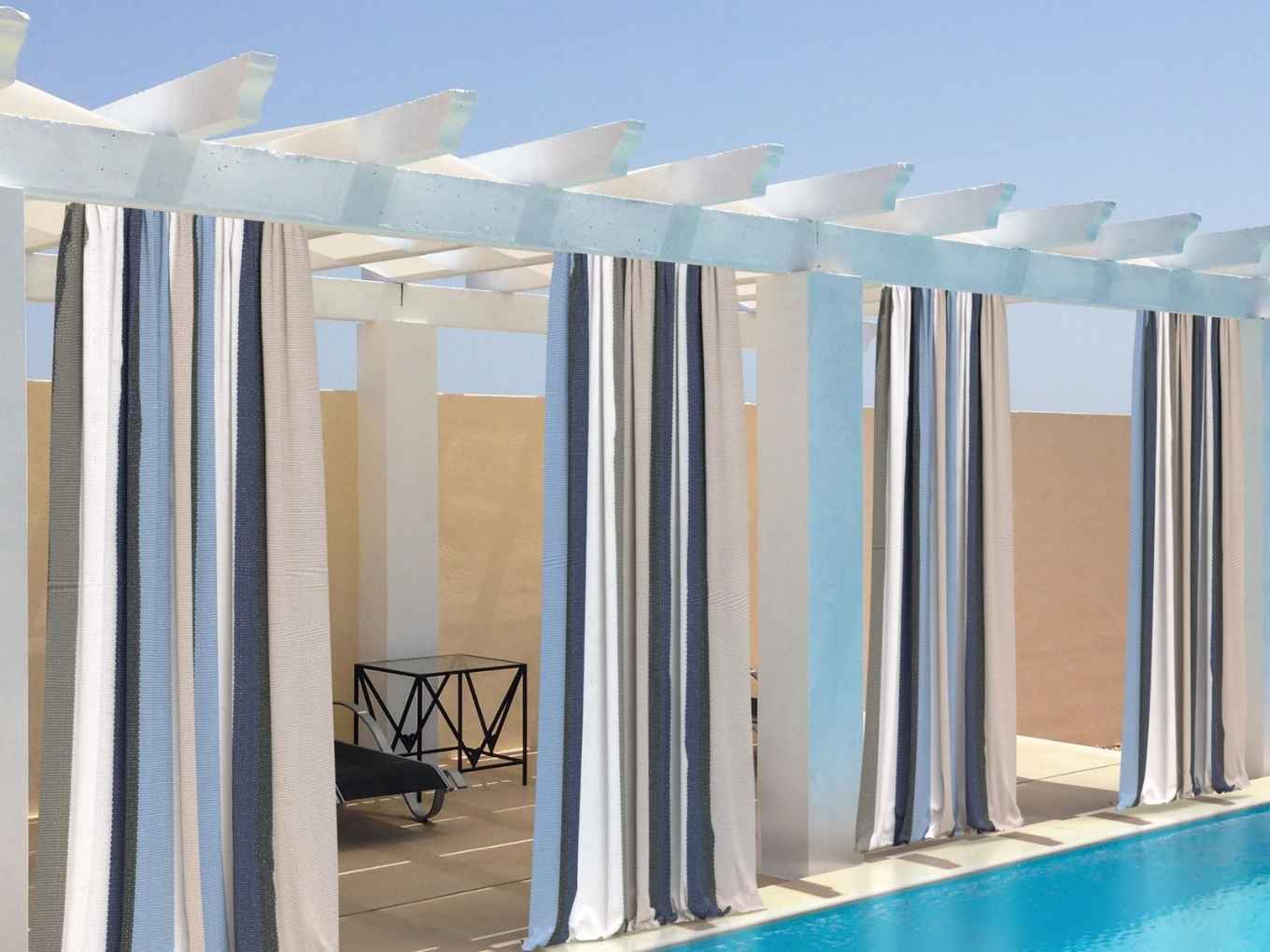 Expert outdoor curtain installation in Dubai